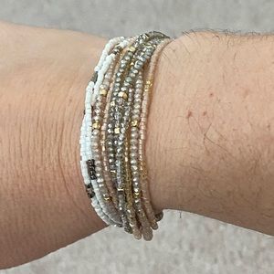 Beaded bracelet with adjustable cord